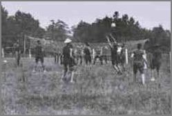 History of Volleyball including a picture of players from the YMCA